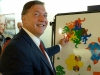Sam Stanley, President of Stony Book University, enjoying our tessellating monkey magnets.